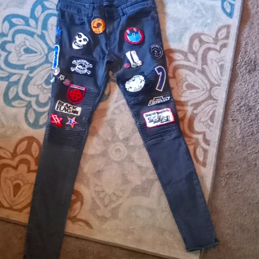Black custom patchwork stacked skinny moto denim